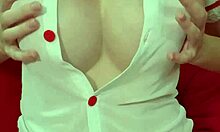 Pretty blonde in see-through dress bounces huge fake tits close-up amateur