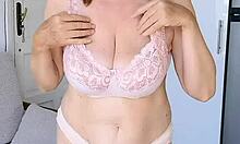 mature milf strips slowly teases with toys close-up on shaved pussy
