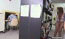 bookish teen spreads pussy pages wide in quiet library corner