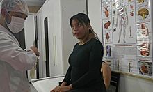 gynecologist checks distracted lesbian couple during exam one scrolls phone