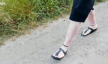 barefoot chubby walks in birkenstocks through nature's trails