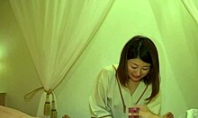 japanese milf strokes cock begging for more handjobs