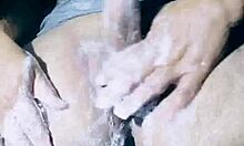 Isn't it tempting watching this exotic naked beauty stroke her sensual body under shower spray outdoors?