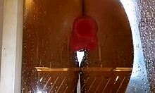wet teen with juicy big ass spreads cheeks in shower fucking pink dildo closeup