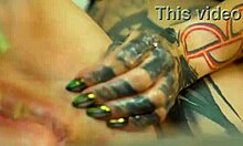 two alternative tattooed babes spread shaved pussies for friend's fisting