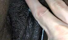 Juicy Lucy fingers creamy wet shaved pussy to orgasm