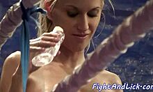 Oiled lesbian babes wrestle while fingering and licking pussies