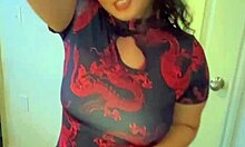 Slim Asian in dress slurps huge cock then creampied doggystyle