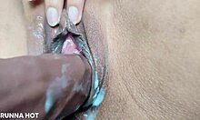 Brazilian teen fingers wet shaved pussy on bed getting naked