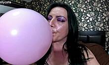 Curvy mommy in satin pajamas teases with balloon fetish barefoot nail play popping