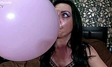 Curvy mommy in satin pajamas teases with balloon fetish barefoot nail play popping
