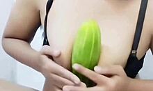 indonesian hijab housewife masturbates hairy pussy with cucumber squirts fresh milk from big natural tits