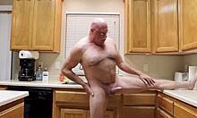 Naked Bodybuilder Stretches Sheer Fabric in Kitchen Workout Flash