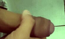 Horny cuck jerks off close-up in work bathroom watching his wife