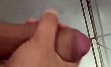 Horny cuck jerks off close-up in work bathroom watching his wife