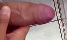 Horny cuck jerks off close-up in work bathroom watching his wife