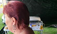 Filthy tattooed kiwi milf squats pissing on campground dirt near campers