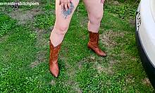 Filthy tattooed kiwi milf squats pissing on campground dirt near campers