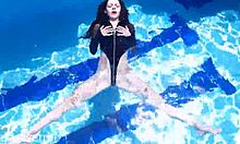 latex jessica bunny sinks into seductive underwater pool