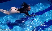 latex jessica bunny sinks into seductive underwater pool