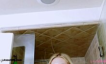 ELEGANT shy blonde MILF strips down for a steamy shower revealing her petite curves on the sofa
