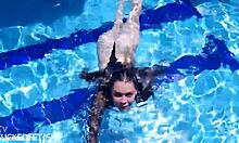 latex jessica bunny sinks into seductive underwater pool
