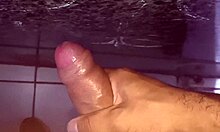 corno strokes off desperately in public bathroom close-up