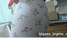 watch this fat milf masturbate bent over in pajamas showing off her curvy cameltoe!