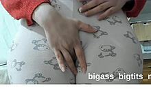 watch this fat milf masturbate bent over in pajamas showing off her curvy cameltoe!