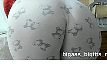 watch this fat milf masturbate bent over in pajamas showing off her curvy cameltoe!