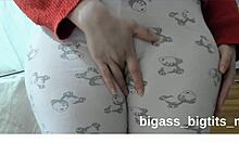 watch this fat milf masturbate bent over in pajamas showing off her curvy cameltoe!