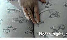 watch this fat milf masturbate bent over in pajamas showing off her curvy cameltoe!