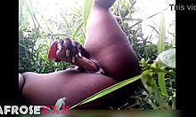 Exploited African Teen Fucks Massive Dildo Deep in Jungle Forest Amid Nature's Wild Call