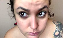 Cute topless kitten applies fetish makeup as sweet girl