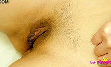 sexy asian teen naked close-up on sofa