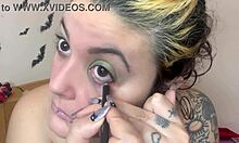 Cute topless kitten applies fetish makeup as sweet girl