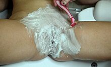 shaving a very hairy pussy with a trimmer and a razor with shaving foam
