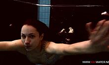 long haired brunette bathes cute in pool