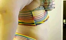 Rainbow clad joan day plays with herself and shakes big ass