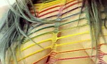 Rainbow clad joan day plays with herself and shakes big ass