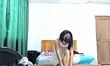 the busty executive in white dress makes sensual movements showing vagina
