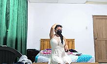 the busty executive in white dress makes sensual movements showing vagina