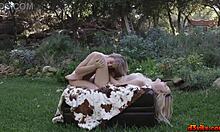 blonde teens kiss and lick in the garden sun