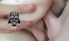 He holds both penises to make her orgasm during double penetration