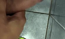 husband strokes his cock in public close up