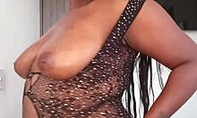 Brunette rubs her pussy and oils tits