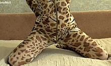 beauty gives footjob in bodysuit