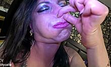 air holding in pantyhose and shiny bra puffy cheeks red face and intense control