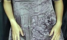 Indo girl tries new satin dresses