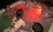 Hot jacuzzi party with three men and two women